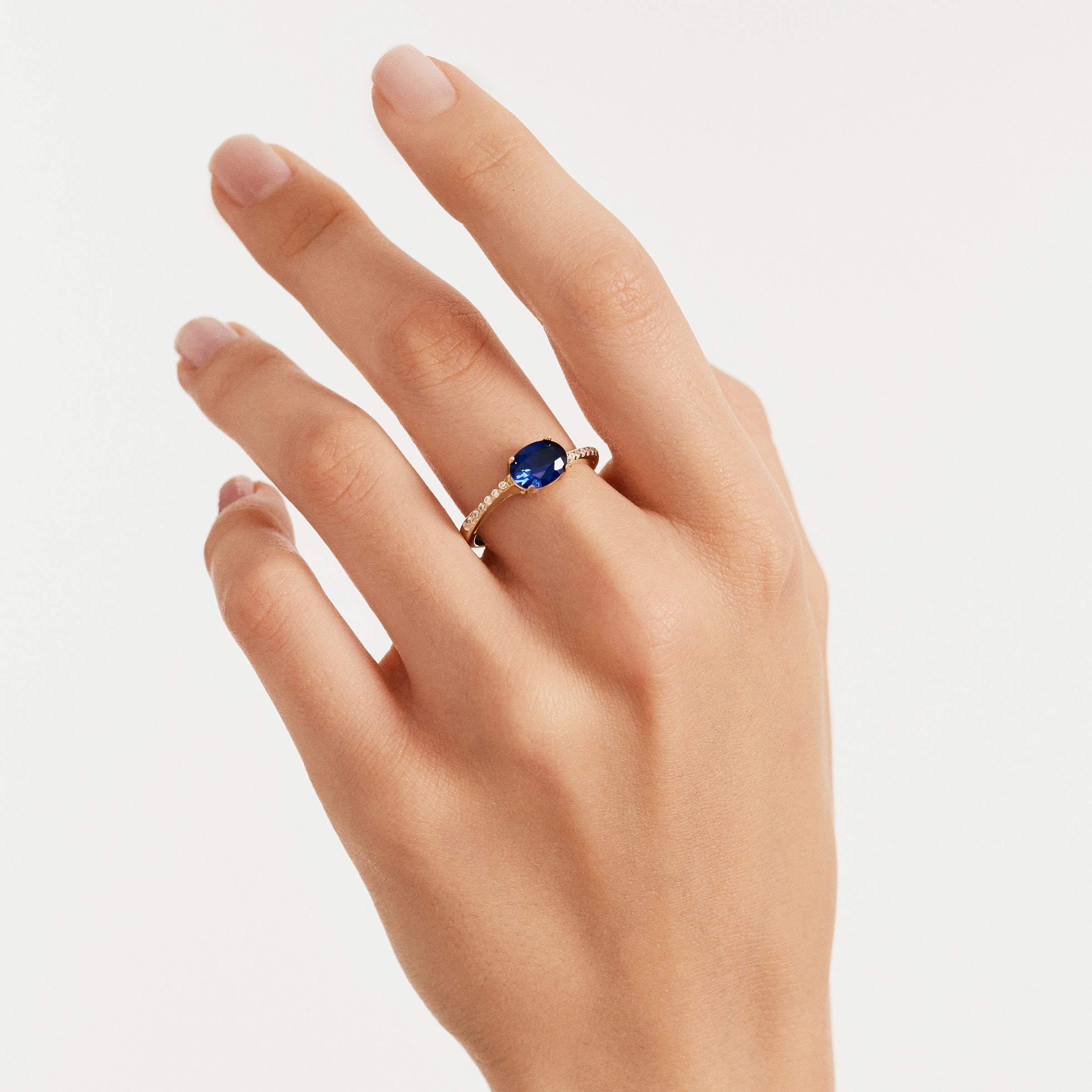 Oval Sapphire Accent CZ Ring in 14K Gold