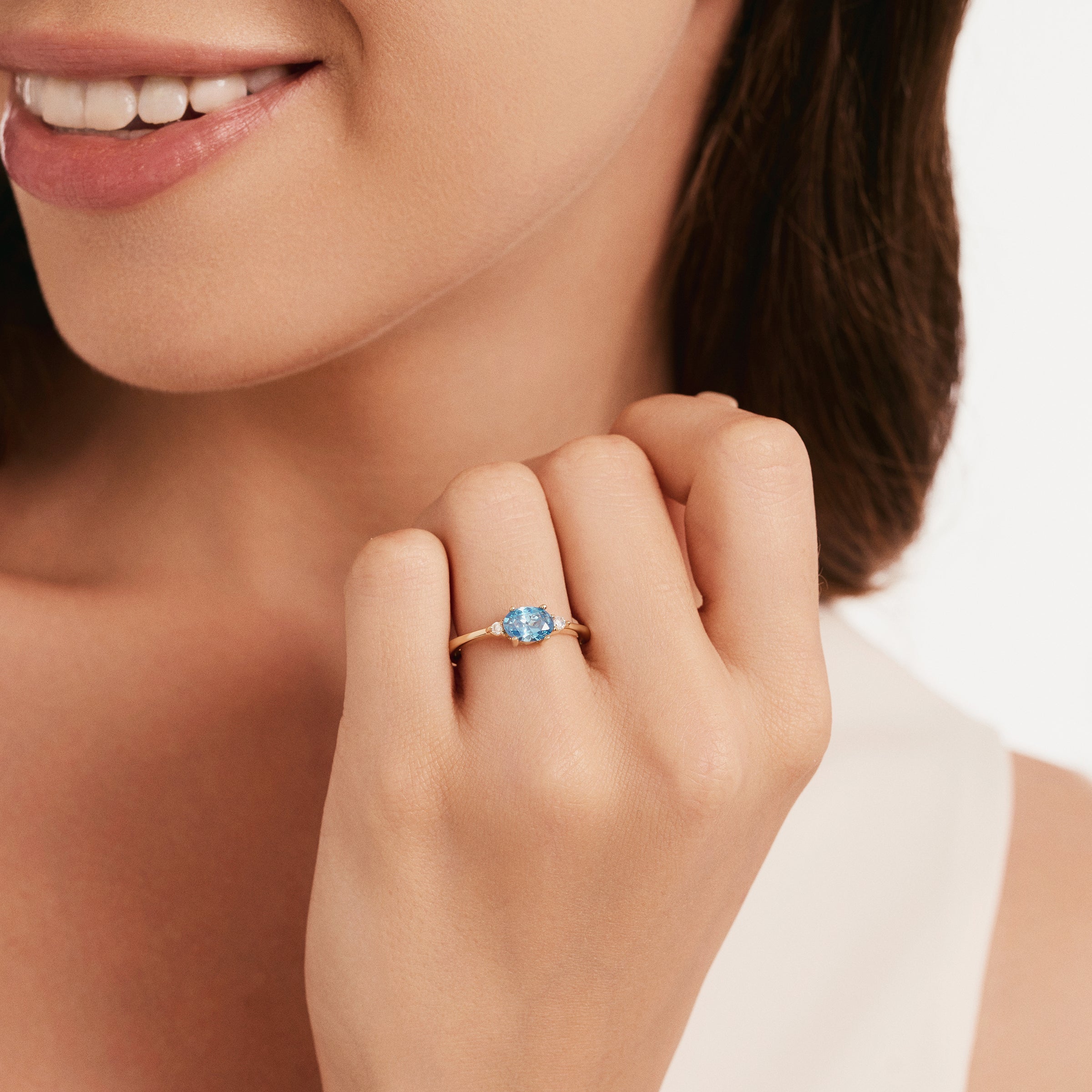 Oval Blue Topaz CZ Ring in 14K Gold