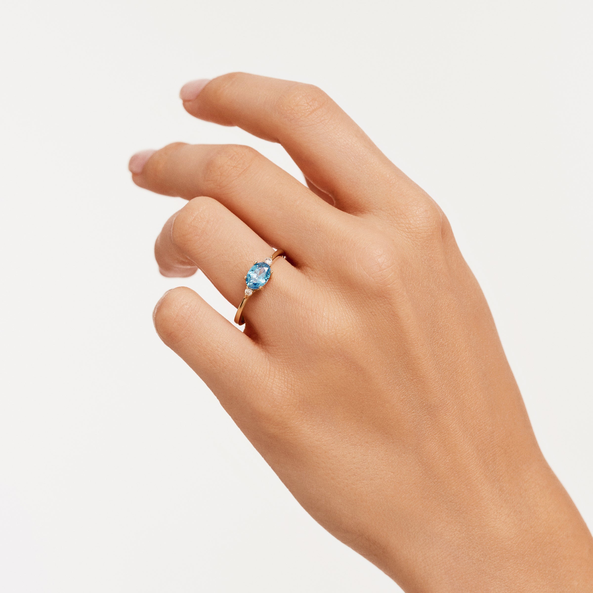 Oval Blue Topaz CZ Ring in 14K Gold