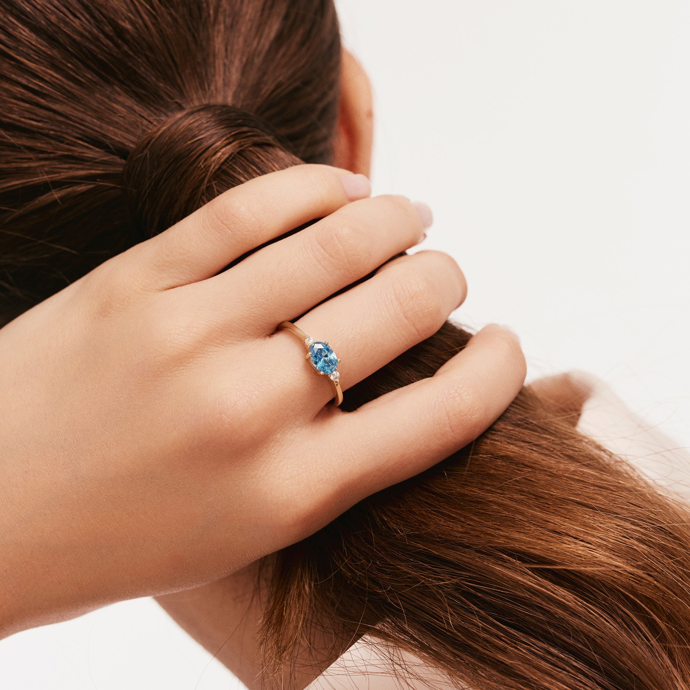 Oval Blue Topaz CZ Ring in 14K Gold