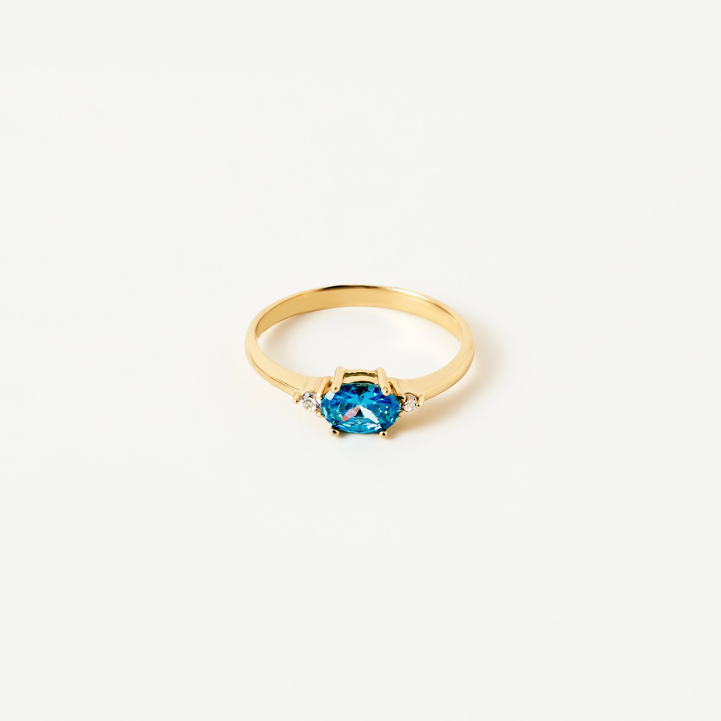 Oval Blue Topaz CZ Ring in 14K Gold