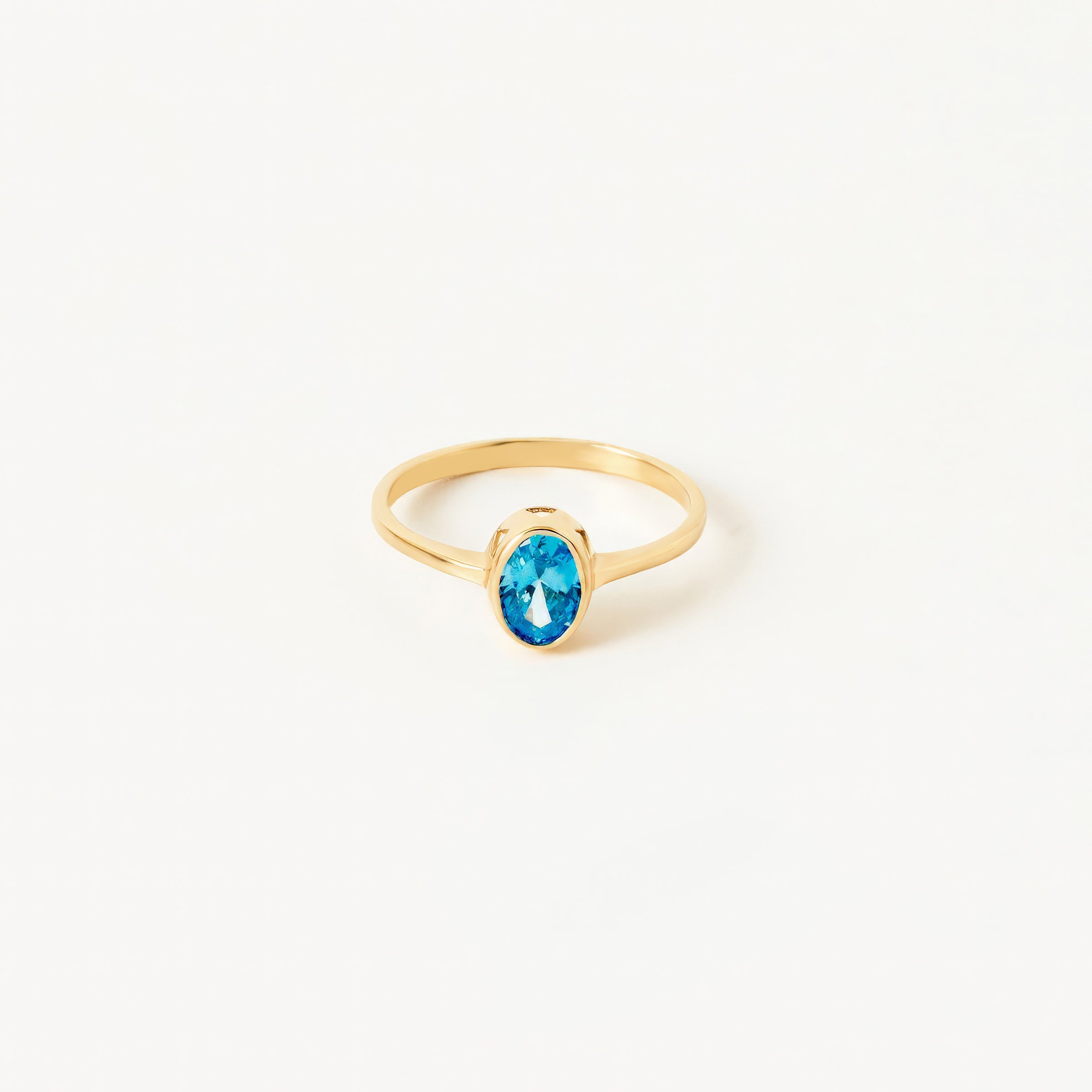 Solitaire Blue Topaz Gemstone Ring in 14K Gold