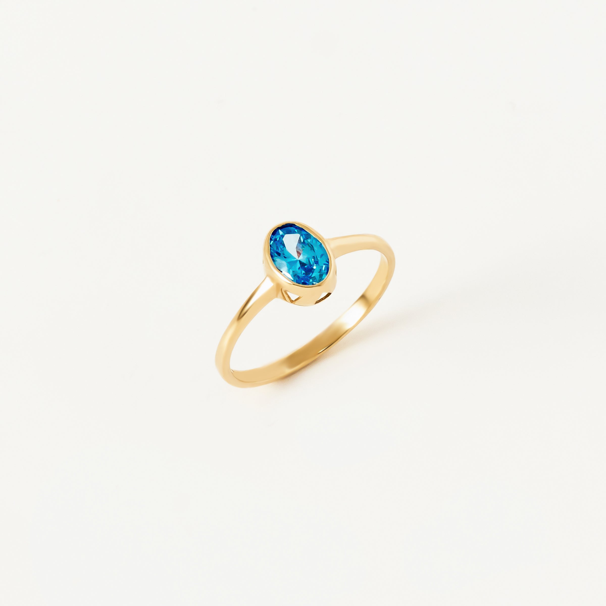 Solitaire Blue Topaz Gemstone Ring in 14K Gold